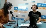 Screen capture from video of Yair Netanyahu, right, during an interview with the Galei Israel radio station. (Twitter)
