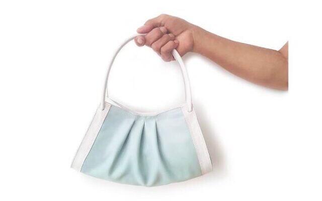 Kobi Levi's Face It handbag, inspired by the blue disposable masks worn by many during COVID-19 (Courtesy Kobi Levi) Kobi Levi's Face It handbag, inspired by the blue disposable masks worn by many during COVID-19 (Courtesy Kobi Levi)