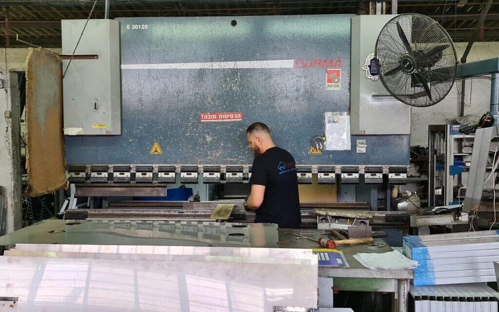 An employee working at Nirometal Ltd., a maker of equipment for professional kitchens; Nov. 5, 2020 (Courtesy) An employee working at Nirometal Ltd., a maker of equipment for professional kitchens; Nov. 5, 2020 (Courtesy)