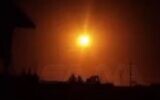 A Syrian anti-aircraft missile explodes in mid-air, lighting up the night sky near Damascus on November 24, 2020. (SANA)