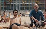 Niv Nissim (left) and John Benjamin Hickey in Eytan Fox's new film, 'Sublet,' the opening film of the rescheduled digital Jerusalem Film Festival, opening December 10, 2020 (Courtesy Daniel Miller)