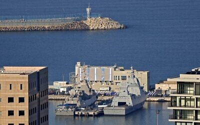 The German-made Saar 6-class corvette (R) purchased by the Israel Navy is moored at the military port of Haifa, after its arrival on December 2, 2020. (Jack Guez/AFP)