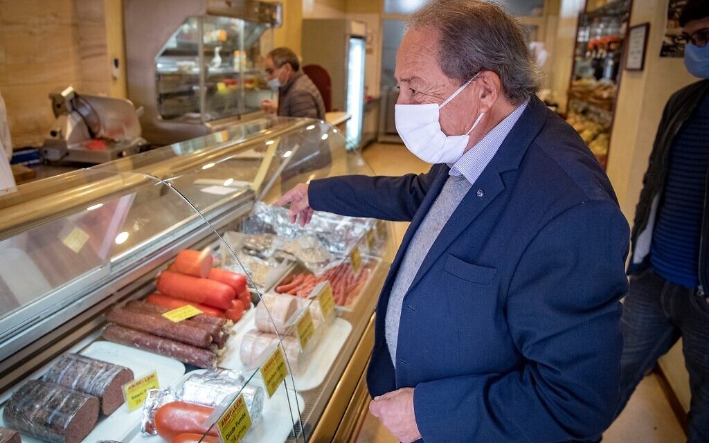 A Moroccan Jewish man chooses cold cuts at a kosher butcher shop 'Amsellem'  in the western Moroccan port city of Casablanca, on December 11, 2020. (FADEL SENNA / AFP)