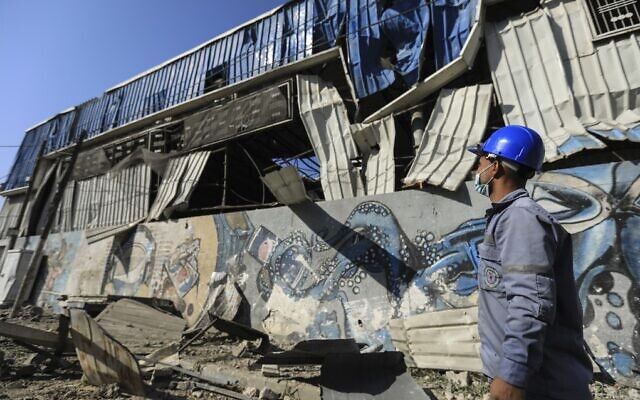 A Palestinian man checks damage caused by an overnight Israeli air strike on Hamas targets in Gaza City, on December 26, 2020, after terrorists in the Palestinian enclave fired rockets toward Israeli territory. (Mahmud Hams/AFP) A Palestinian man checks damage caused by an overnight Israeli air strike on Hamas targets in Gaza City, on December 26, 2020, after terrorists in the Palestinian enclave fired rockets toward Israeli territory. (Mahmud Hams/AFP)