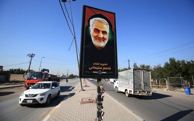 Iraqis drive past a poster depicting late Iranian Revolutionary Guards commander Qasem Soleimani in Iraq's capital Baghdad, on December 30, 2020, ahead of the first anniversary of his killing in a US drone attack. (Ahmad Al-Rubaye / AFP) Iraqis drive past a poster depicting late Iranian Revolutionary Guards commander Qasem Soleimani in Iraq's capital Baghdad, on December 30, 2020, ahead of the first anniversary of his killing in a US drone attack. (Ahmad Al-Rubaye / AFP)