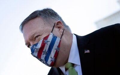 US Secretary of State Mike Pompeo leaves the White House in Washington on December 11, 2020. (Brendan Smialowski/AFP)