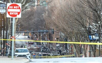Police close off an area damaged by an explosion on Christmas morning on December 25, 2020 in Nashville, Tennessee (Terry Wyatt/Getty Images/AFP)