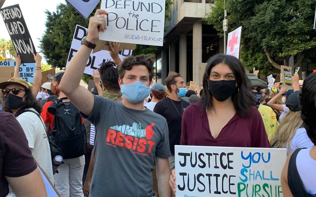 A Jewish demonstrator holds a sign as part of social justice protests following the death of George Floyd. (Courtesy of Sumekh/ via JTA) A Jewish demonstrator holds a sign as part of social justice protests following the death of George Floyd. (Courtesy of Sumekh/ via JTA)