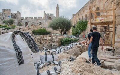 Amit Re’em, Jerusalem District Archaeologist at the Israel Antiquities Authority, directs archaeologists at the Tower of David Museum. (IAA)