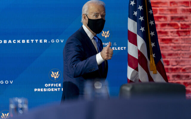 US President-elect Joe Biden departs a news conference after introducing his nominees and appointees to economic policy posts at The Queen theater, Tuesday, Dec. 1, 2020, in Wilmington, Del. (AP Photo/Andrew Harnik) US President-elect Joe Biden departs a news conference after introducing his nominees and appointees to economic policy posts at The Queen theater, Tuesday, Dec. 1, 2020, in Wilmington, Del. (AP Photo/Andrew Harnik)