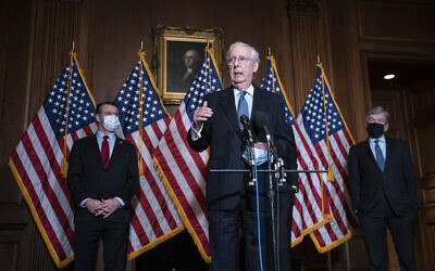 Senate Majority Leader Mitch McConnell of Kentucky, speaks during a news conference following a weekly meeting with the Senate Republican caucus, December 8, 2020 at the Capitol in Washington. (Sarah Silbiger/Pool via AP)