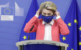 European Commission President Ursula von der Leyen arrives to deliver a statement at the EU headquarters in Brussels, December 13, 2020. (Olivier Hoslet/Pool Photo via AP)