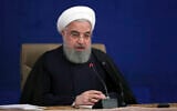Iranian President Hassan Rouhani speaks during a press conference in Tehran, Iran, December 14, 2020. (Iranian Presidency Office via AP)