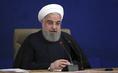 Iranian President Hassan Rouhani speaks during a press conference in Tehran, Iran, December 14, 2020. (Iranian Presidency Office via AP)