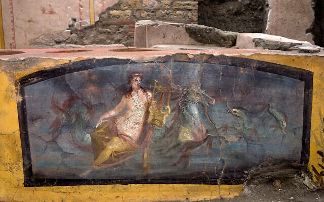 An undated photo made available by the Pompeii Archeological park press office shows the thermopolium in the Pompeii archeological park, near Naples, Italy.  (Luigi Spina/Parco Archeologico di Pompei via AP)