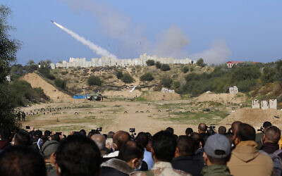 Illustrative: A rocket is fired into the sea during a military drill organized by terror groups outside Gaza City, Tuesday, Dec. 29, 2020. (AP Photo/Adel Hana)