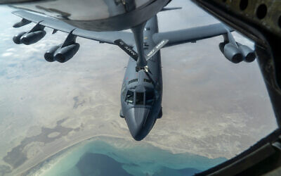 A US Air Force B-52H 'Stratofortress' from Minot Air Force Base, N.D., is refueled by a KC-135 'Stratotanker' in the US Central Command area of responsibility, Dec. 30, 2020. (Senior Airman Roslyn Ward/U.S. Air Force via AP)