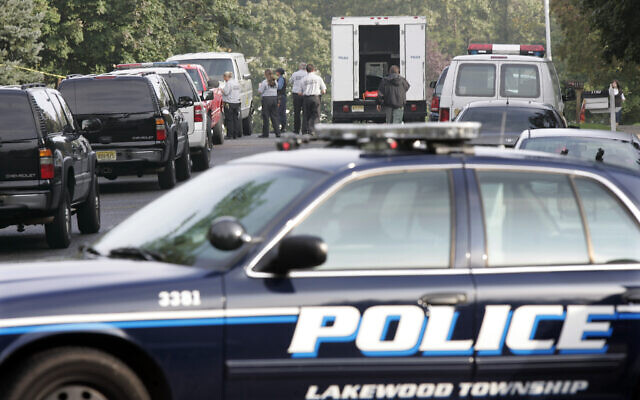 Illustrative: Investigators work at a crime scene Thursday, Sept. 24, 2009, in Lakewood, N.J.(AP Photo/Mel Evans) Illustrative: Investigators work at a crime scene Thursday, Sept. 24, 2009, in Lakewood, N.J.(AP Photo/Mel Evans)