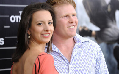 Andrew Giuliani (R) and Olympic figure skater Sarah Hughes attend the the world premiere of 'The Other Guys' at the Ziegfeld Theatre on Monday, Aug. 2, 2010 in New York. (AP Photo/Evan Agostini)