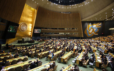 Illustrative: People gather at the General Assembly, prior to a vote, on December 21, 2017, at United Nations headquarters. (AP Photo/Mark Lennihan)