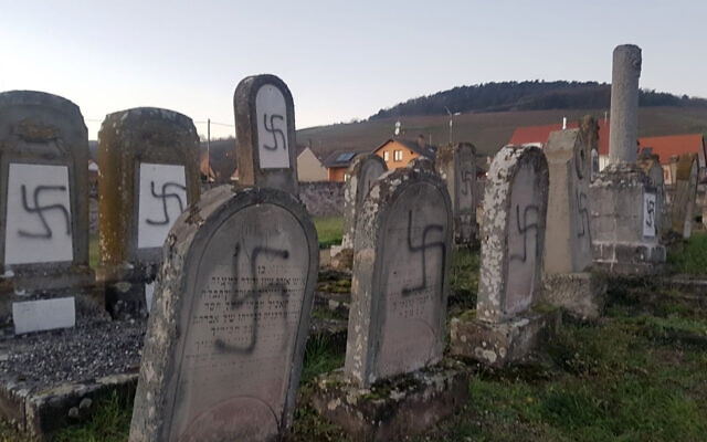 Tombs tagged with swastikas are pictured in a Jewish cemetery in Westhoffen, eastern France, December 3, 2019. (AP Photo) Tombs tagged with swastikas are pictured in a Jewish cemetery in Westhoffen, eastern France, December 3, 2019. (AP Photo)