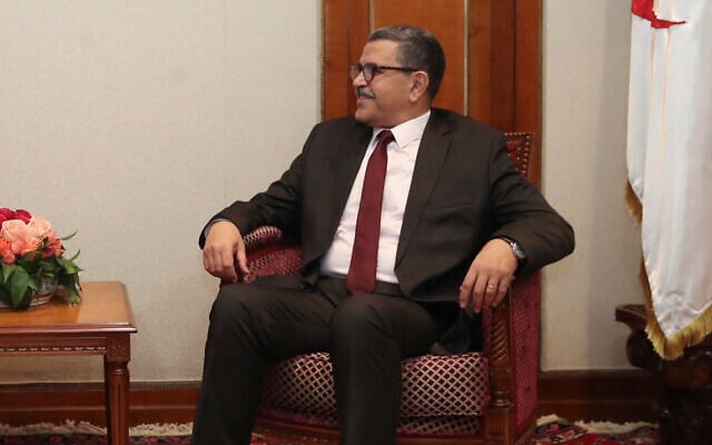 Turkey's Foreign Minister Mevlut Cavusoglu, left, and Algeria's Prime Minister Abdelaziz Djerad speak during a meeting in Algiers, Algeria, Jan. 7, 2020. (Turkish Foreign Ministry via AP, Pool) Turkey's Foreign Minister Mevlut Cavusoglu, left, and Algeria's Prime Minister Abdelaziz Djerad speak during a meeting in Algiers, Algeria, Jan. 7, 2020. (Turkish Foreign Ministry via AP, Pool)
