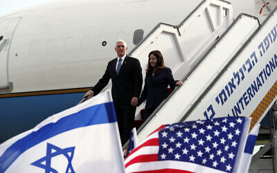 US Vice President Mike Pence and his wife Karen disembark from a plane upon their arrival at Ben Gurion International Airport to attend the World Holocaust Forum at the Yad Vashem memorial center, January 23, 2020. (Ammar Awad/Pool Photo via AP)