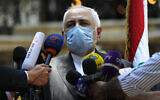 Iranian Foreign Minister Mohammad Javad Zarif speaks outside the Lebanese Foreign Ministry, August 14, 2020. (AP Photo/Hussein Malla)