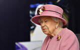 Britain's Queen Elizabeth II visits the Defence Science and Technology Laboratory (DSTL) at Porton Down, England, October 15, 2020. (Ben Stansall/ Pool via AP)