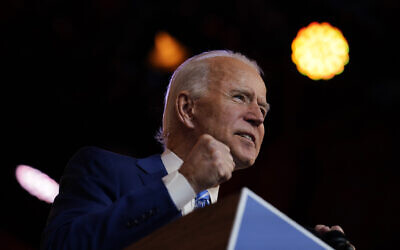 US President-elect Joe Biden speaks at The Queen theater, in Wilmington, Delaware, November 25, 2020. (Carolyn Kaster/AP)