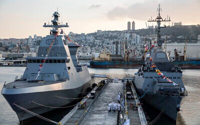 File - The first of four new Sa'ar 6 ships, left, is docked in Haifa on December 2, 2020. (Heidi Levine/Pool Photo via AP)