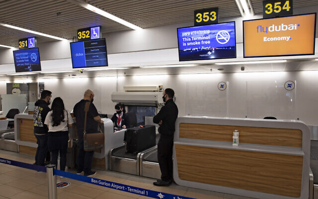 Israelis prepare to fly to Dubai at the Ben Gurion airport near Tel Aviv, Israel, December 3, 2020. (AP Photo/Sebastian Scheiner)