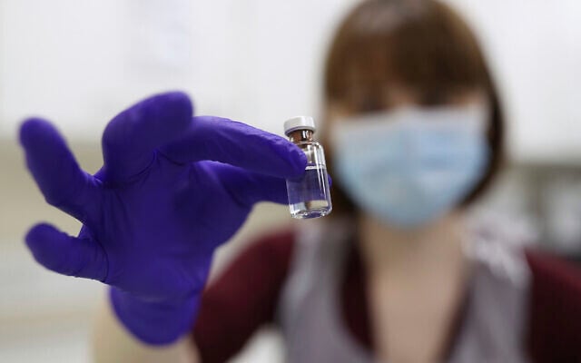 Illustrative: An NHS pharmacy technician at the Royal Free Hospital, simulates the preparation of the Pfizer vaccine to support staff training ahead of the rollout, in London, December 4, 2020. (Yui Mok/Pool Photo via AP) Illustrative: An NHS pharmacy technician at the Royal Free Hospital, simulates the preparation of the Pfizer vaccine to support staff training ahead of the rollout, in London, December 4, 2020. (Yui Mok/Pool Photo via AP)