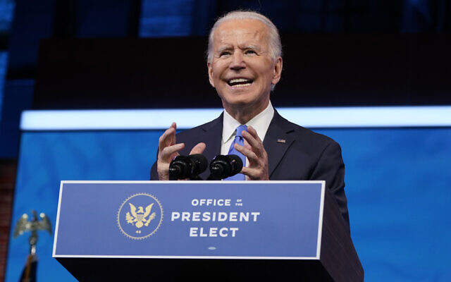 US President-elect Joe Biden speaks after the Electoral College formally elected him as president, at The Queen theater in Wilmington, Delaware, December 14, 2020. (Patrick Semansky/AP) US President-elect Joe Biden speaks after the Electoral College formally elected him as president, at The Queen theater in Wilmington, Delaware, December 14, 2020. (Patrick Semansky/AP)