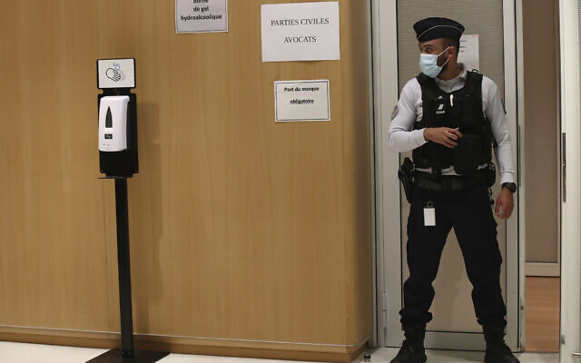 Illustrative -- A police officer guards the courtroom at the Paris Hall of Justice, Dec. 16, 2020 in Paris (AP Photo/Michel Euler) Illustrative -- A police officer guards the courtroom at the Paris Hall of Justice, Dec. 16, 2020 in Paris (AP Photo/Michel Euler)