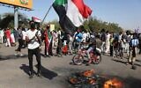 Protesters gather during a demonstration, in Khartoum, Sudan, Saturday, Dec. 19, 2020 (AP Photo/Marwan Ali)