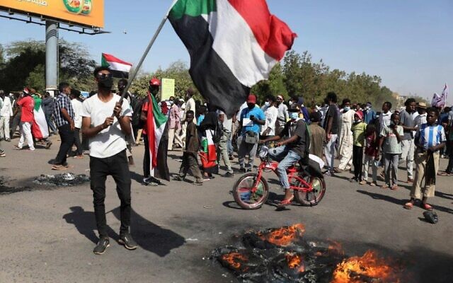 Protesters gather during a demonstration, in Khartoum, Sudan, Saturday, Dec. 19, 2020 (AP Photo/Marwan Ali) Protesters gather during a demonstration, in Khartoum, Sudan, Saturday, Dec. 19, 2020 (AP Photo/Marwan Ali)