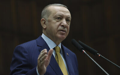 Turkey's President Recep Tayyip Erdogan speaks to his ruling party's lawmakers, in Ankara, Turkey, Wednesday, Dec. 23. 2020 (Turkish Presidency via AP, Pool)