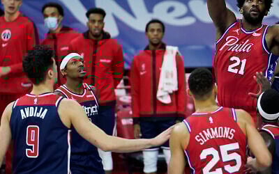 Deni Avdija, number 9, makes his NBA debut with the Washington Wizards, December 23, 2020, in Philadelphia. (AP Photo/Matt Slocum)