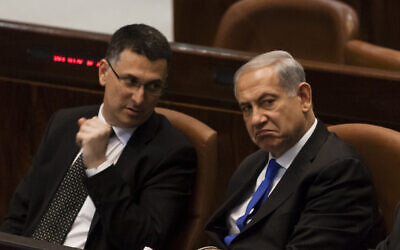 Prime Minister Benjamin Netanyahu and then-internal affairs minister Gideon Sa'ar, in the Knesset, July 9, 2013. (Flash90/ File)