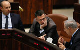 Prime Minister Benjamin Netanyahu (right) in the Knesset on July 29, 2013, with Naftali Bennett (left) and Gideon Sa'ar. (Miriam Alster/FLASH90/File)