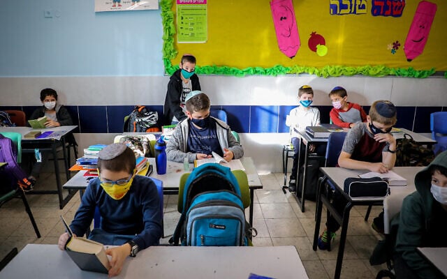 Students in a classroom at a school in the West Bank settlement of Efrat, November 24, 2020. (Gershon Elinson/Flash90) Students in a classroom at a school in the West Bank settlement of Efrat, November 24, 2020. (Gershon Elinson/Flash90)