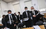 Prime Minister Benjamin Netanyahu's lawyers, Boaz Ben Tzur (right) and Amit Hadad (second right), at the Jerusalem District Court for a hearing on December 6, 2020. (Yonatan Sindel/Flash90)
