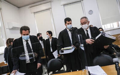 Prime Minister Benjamin Netanyahu's lawyers, Boaz Ben Tzur (right) and Amit Hadad (second right), at the Jerusalem District Court for a hearing on December 6, 2020. (Yonatan Sindel/Flash90)