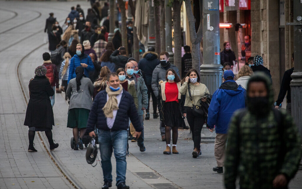 People wearing face masks seen on Jaffa street in downtown Jerusalem on December 15, 2020 (Yonatan Sindel/Flash90) People wearing face masks seen on Jaffa street in downtown Jerusalem on December 15, 2020 (Yonatan Sindel/Flash90)