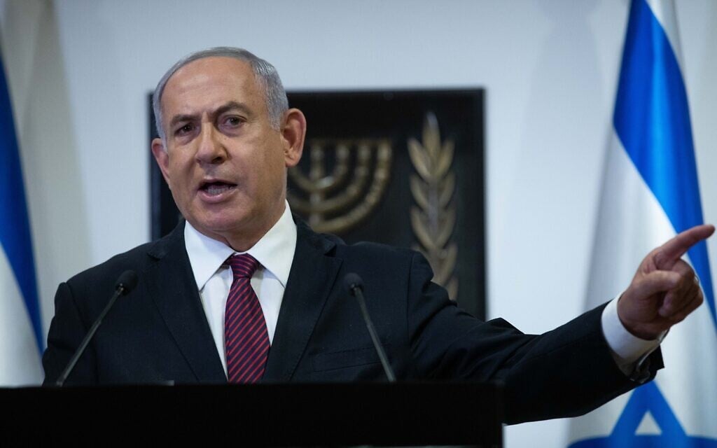 Prime Minister Benjamin Netanyahu speaks during a press conference at the Knesset in Jerusalem on December 22, 2020. (Yonatan Sindel/Flash90)
