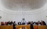 Supreme Court President Esther Hayut and justices arrive to hear petitions against the Jewish Nation-State Law, at the Supreme Court in Jerusalem on December 22, 2020. (Yonatan Sindel/Flash90)