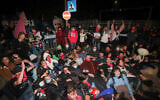 Demonstrators during a protest against Prime Minister Benjamin Netanyahu, outside his official residence in Jerusalem, on December 26, 2020 (Yonatan Sindel/Flash90)