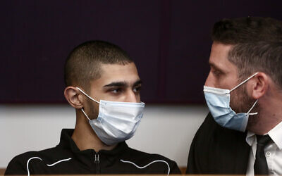 Amir Abu Laban (L) at the Tel Aviv District Court on December 29, 2020. (Miriam Alster/Flash90)