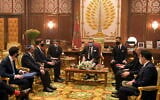 Israeli National Security Adviser Meir Ben-Shabbat (2nd-L) and White House senior adviser Jared Kushner (3rd-L) meet with Moroccan King Mohammed VI (C) at the royal palace in Rabat, Morocco, December 22, 2020. (Amos Ben Gershom/GPO)